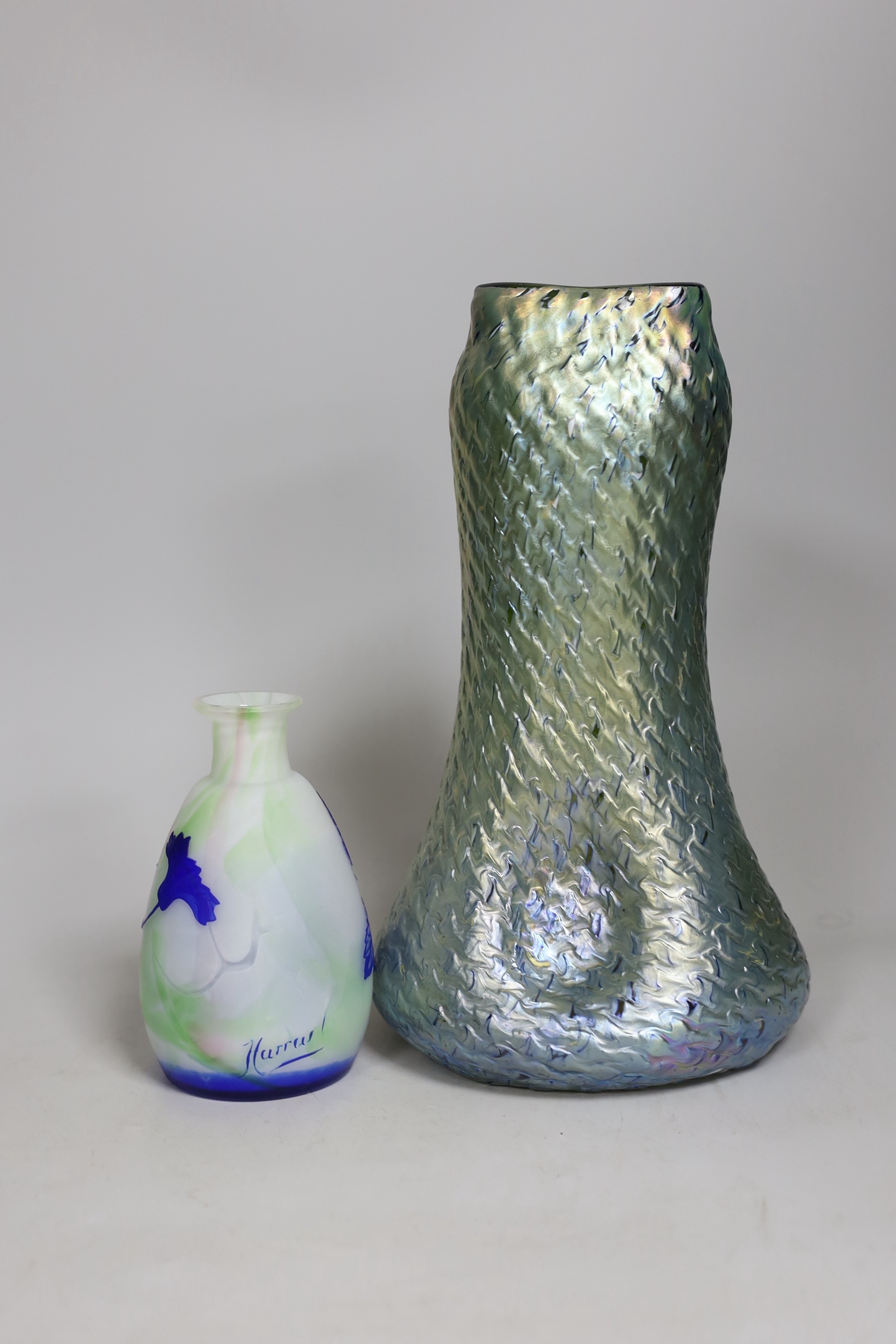 A Harrach cameo glass vase and an iridescent art glass vase. Tallest 27cm